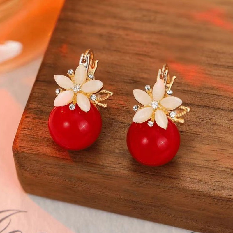 Boucles d'oreilles délicates en perles et fleurs